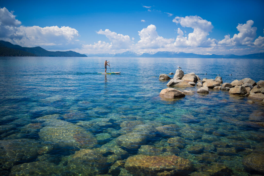 paddleboarder in lake tahoe