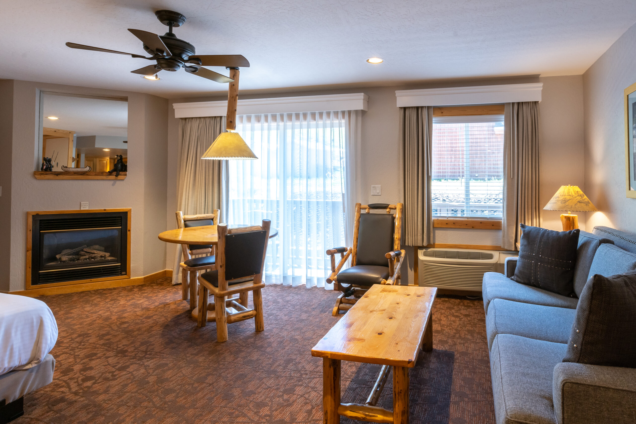 living room with coffee table, couch, chairs